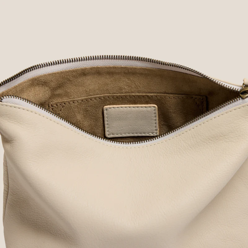 Spacious Leather Zipper Clutch With D-Ring Strap Mounts for Multi Wear Styles