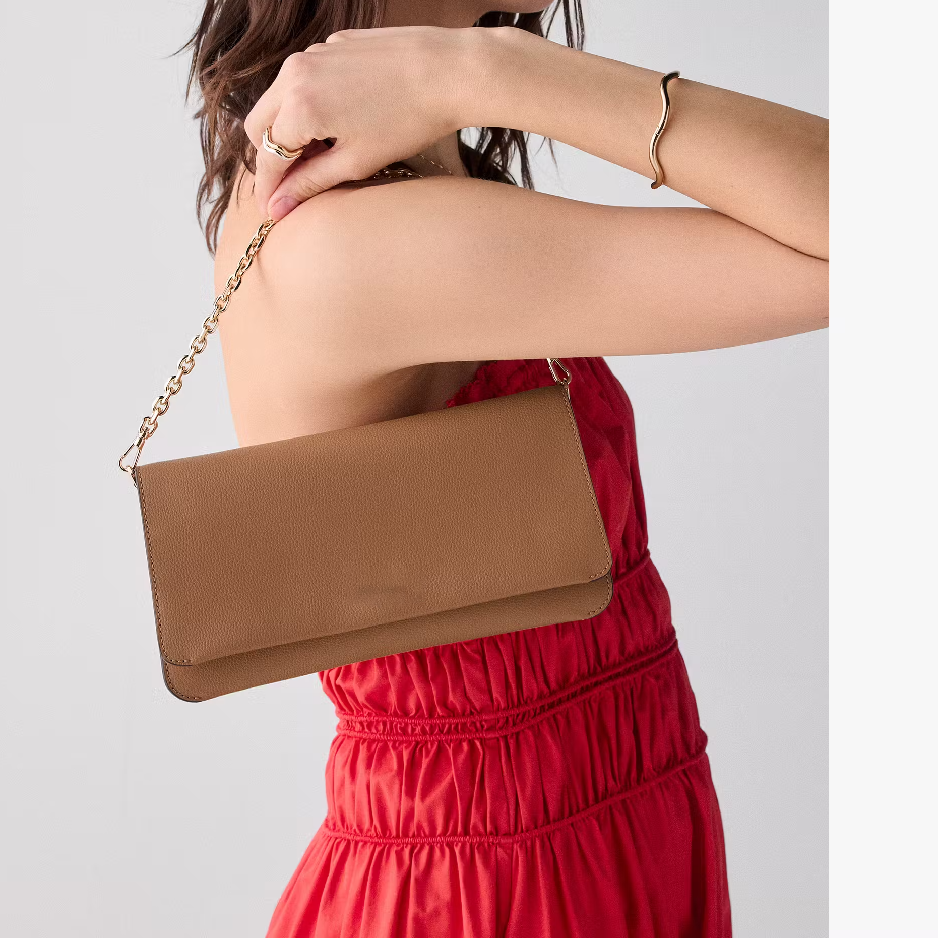 Dual Removable Strap Crossbody Clutch Made of Textured Pebbled Leather With Multi-Layer Storage Layout