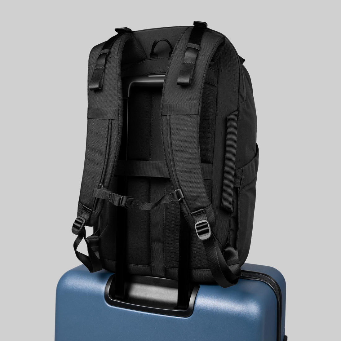 Multi-Pocket Travel Backpack with Luggage Pass-Through and Ergonomic Carrying Framework